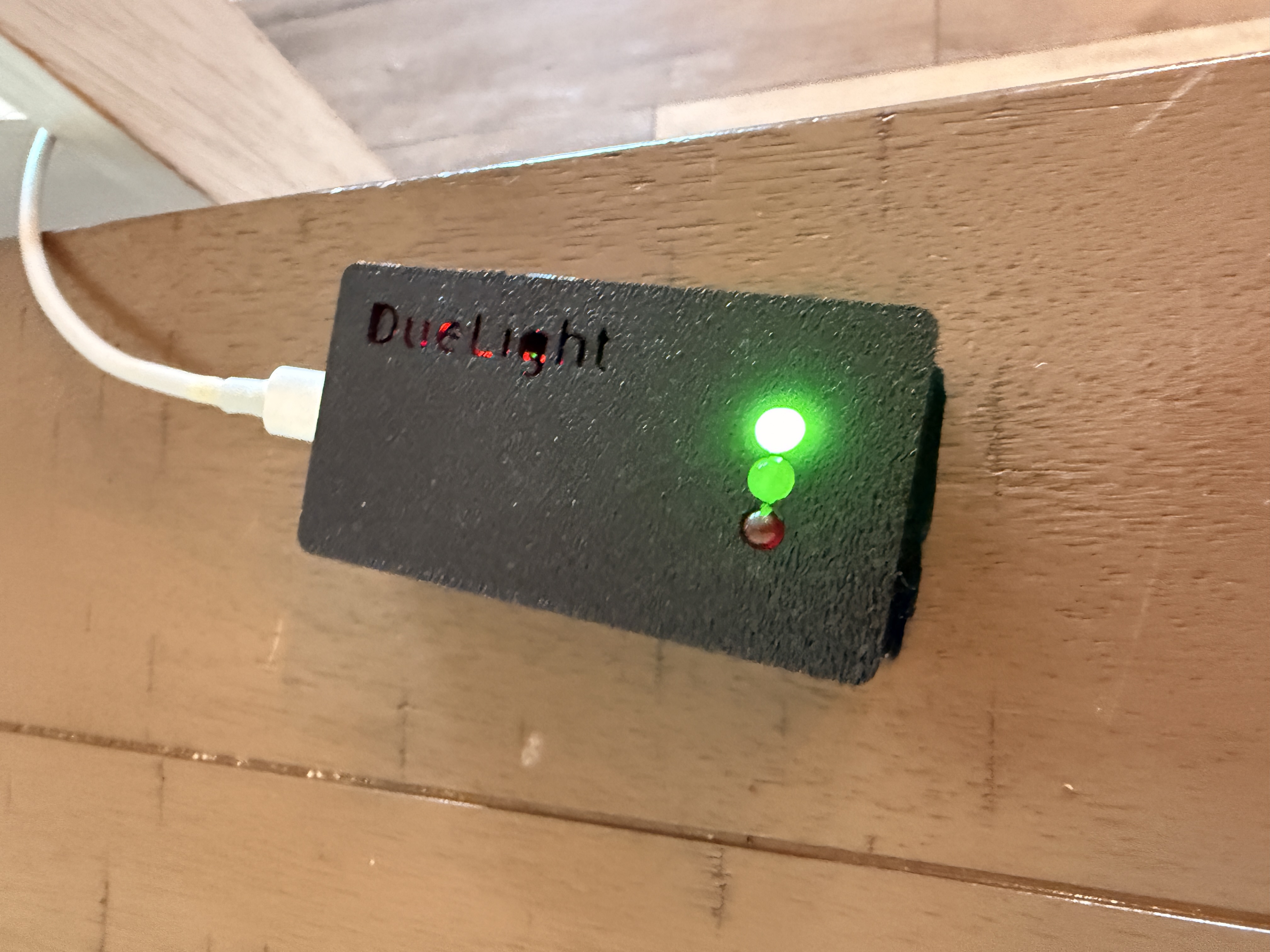 Due Light device showing green LED